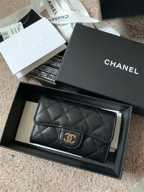 vestiaire collective chanel wallet.